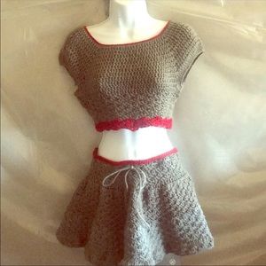 A 2-piece crochet top and mini skirt